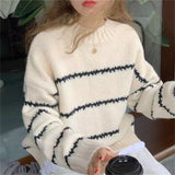 Jacqueline | En tricot à torsades classique Pull