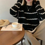 Jacqueline | En tricot à torsades classique Pull