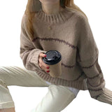Jacqueline | En tricot à torsades classique Pull