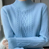 Brigitte | Col roulé en tricot cablé Pull